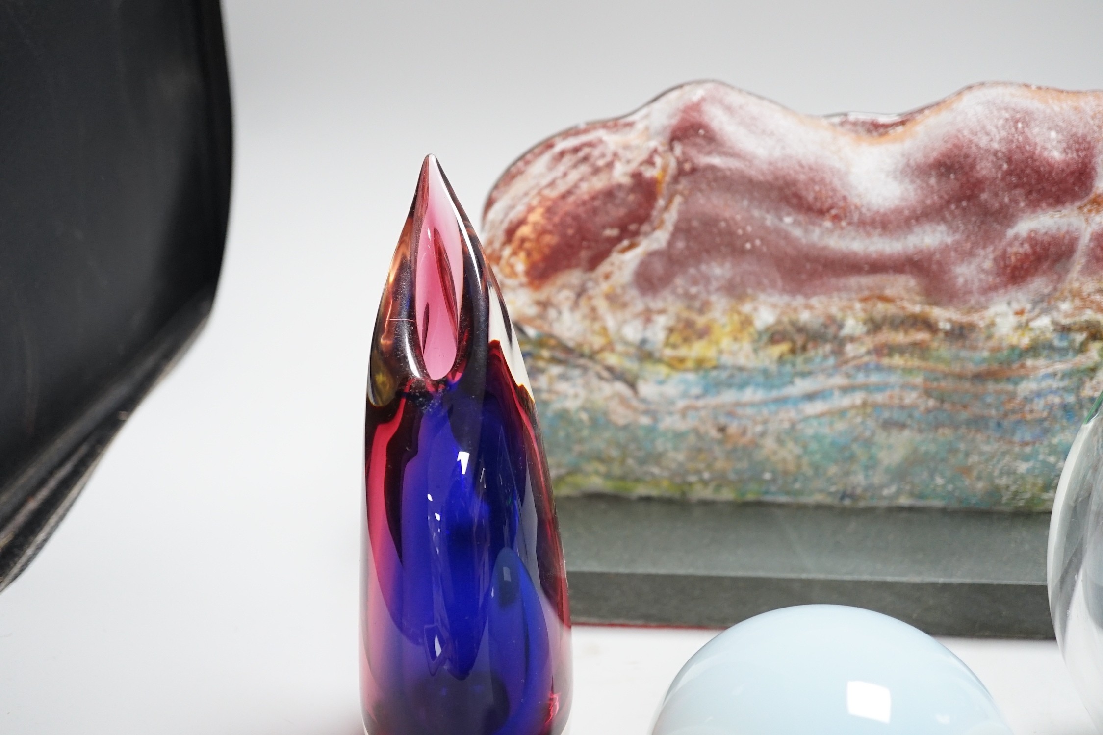 A Murano Oball Vase from Vetreria Artistica, 20cm, a free form green, blue and clear glass vase, 18cm high, an opalescent glass owl paperweight and a slumped glass slab sculpture on stand 25cms wide x 19cms